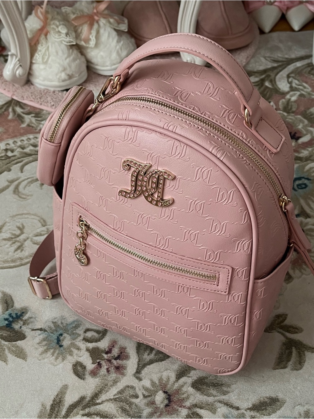 Juicy Couture Blush Pink Embossed Mini Backpack with Gold Accents